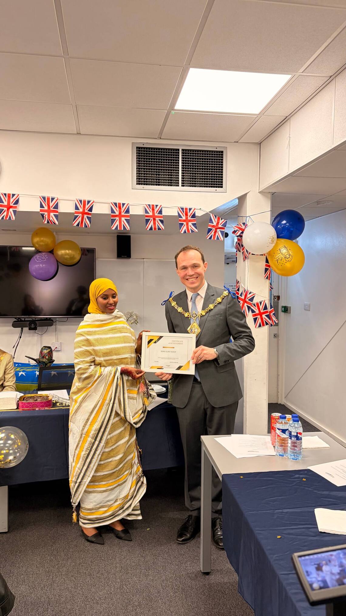 The Mayor Handing out certificates